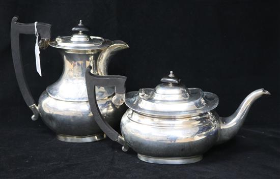 A 1930s silver teapot and coffee pot, by Viners Ltd, Sheffield, 1931, gross 44 oz.